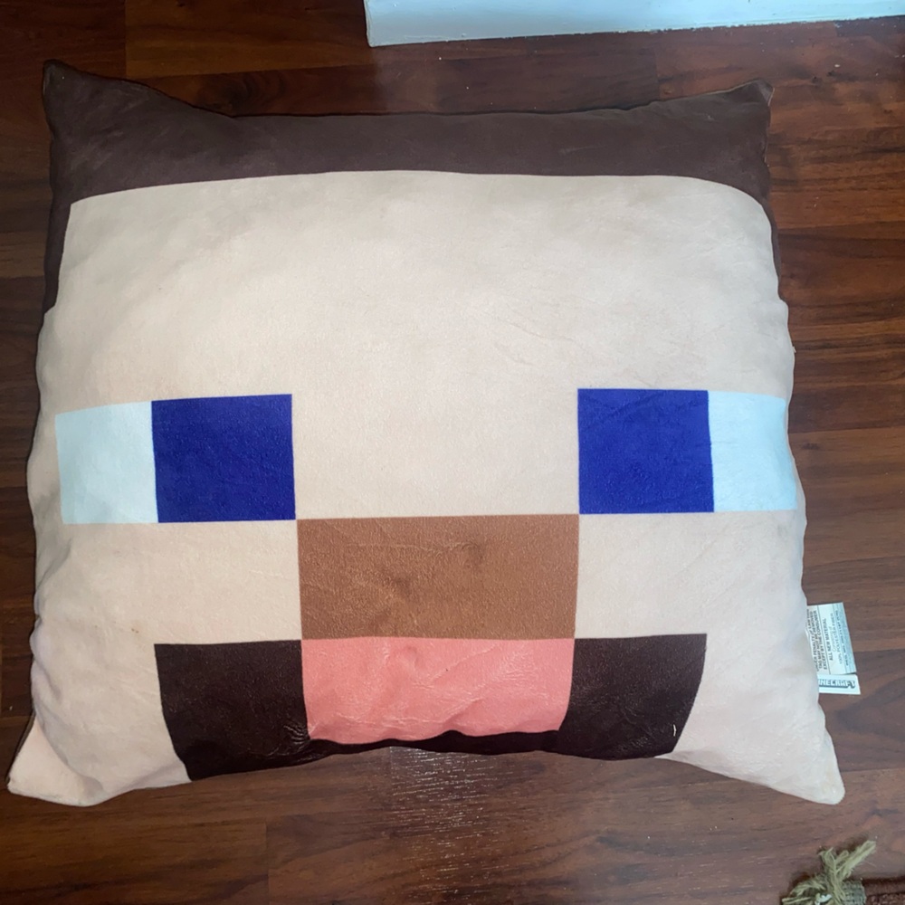 Pixelated Character Face Pillow